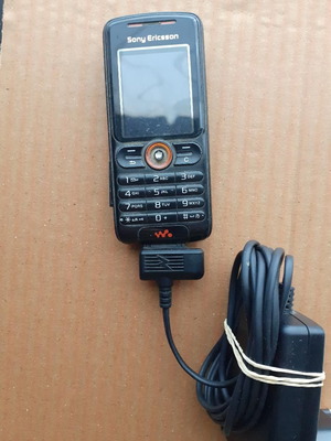 Sony Ericsson phone with charger used
