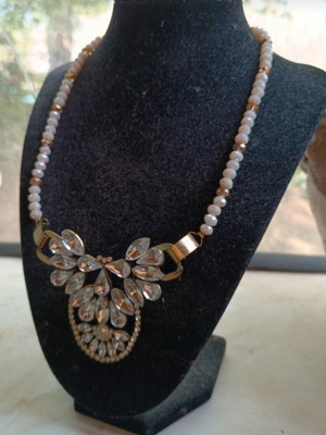 Statement handmade necklace new with metal element and crystals