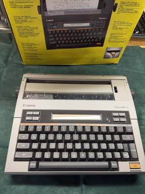 Canon Typestar 6 γραφομηχανή σαν καινούργιο με μελανοταινία και τροφοδοτικό