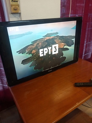 Philips 42-inch TV with remote control