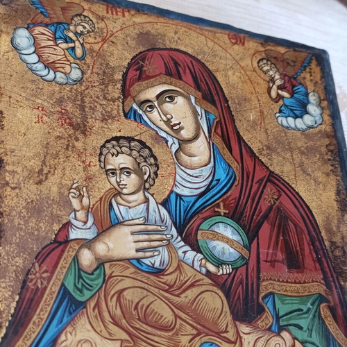 Cardboard box with silk-screened religious icon on canvas