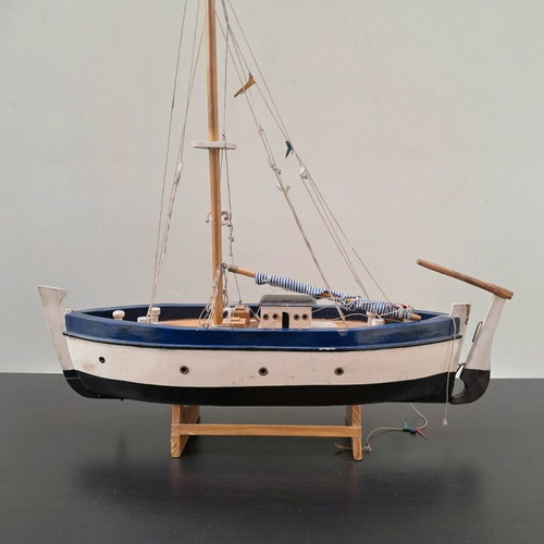 Wooden collectible ship from 1960 used with stand