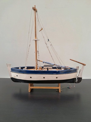 Wooden collectible ship from 1960 used with stand