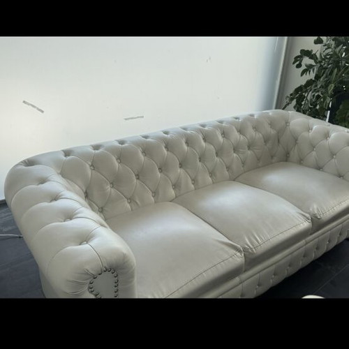 Leather three-seater sofa