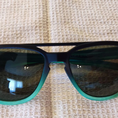 Solo-Solis NDL2709 sunglasses new, transparent green/black frame