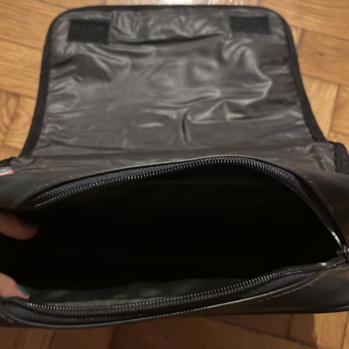 Two black leather toiletry bags, one Adidas