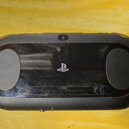 Sony PS Vita Slim console with 8GB card and games