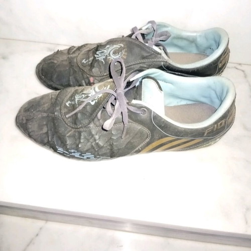 Athletic football shoes used with studs size 42 black and blue