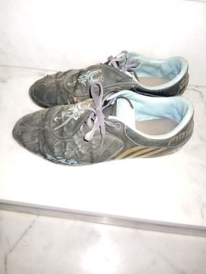 Athletic football shoes used with studs size 42 black and blue