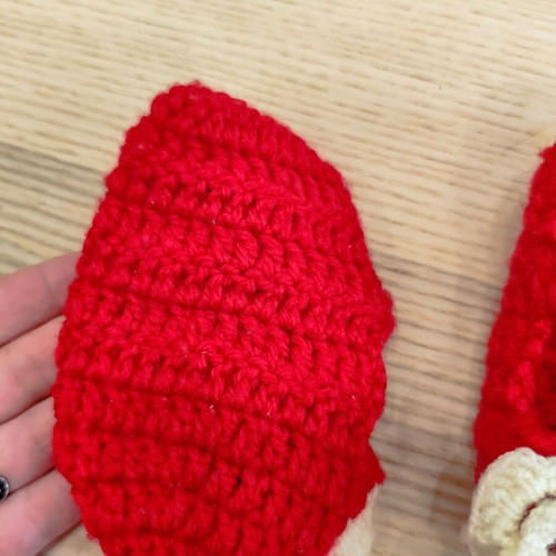 Handmade knitted baby shoes with flower, red