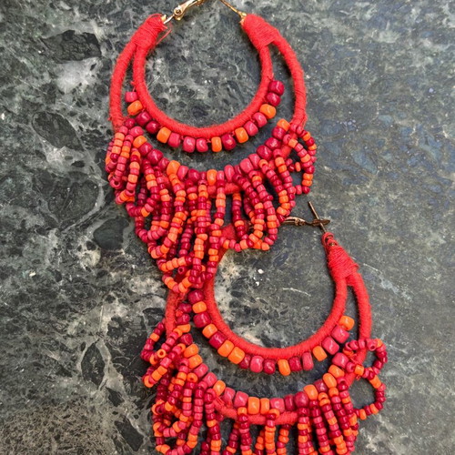 Women's earrings hanging with beads like new, bright color