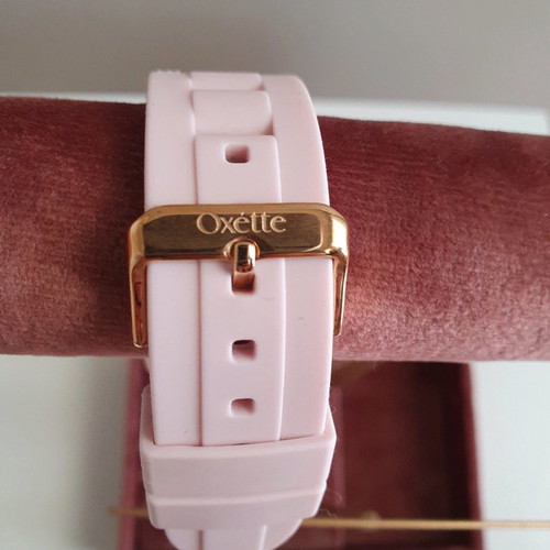 Oxette pink women's watch with rubber strap and pink gold dial like new