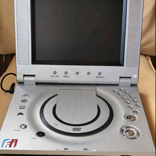 Retro Portable Player 4-in-1 F&U DVP 6051 like new for parts or repair