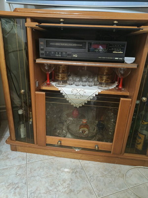 Vintage display cabinet like new with rotating TV stand