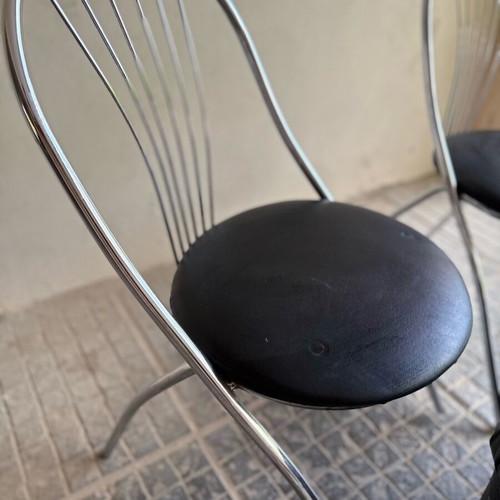 Set of 2 Metal Chairs and Leatherette Ottoman used