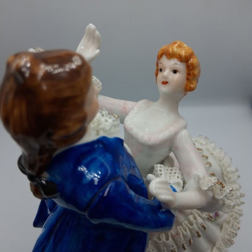 Vintage porcelain music figurine of dancing couple, like new
