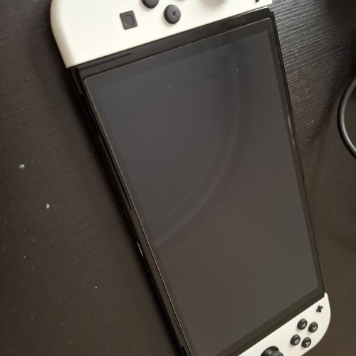 Nintendo Switch like new with original accessories and Super Mario Bros Wonder