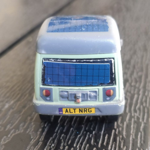 Disney Cars Miles Axlerod 1:55 toy car used, moderate condition