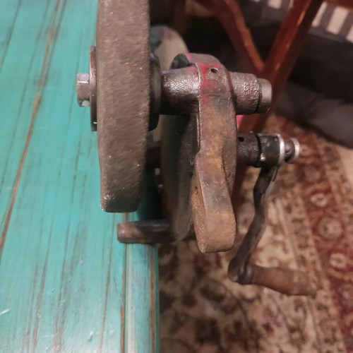 Old hand-operated grinding wheel used