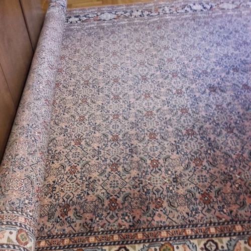 Handmade wool rug used, approximately 10 sqm