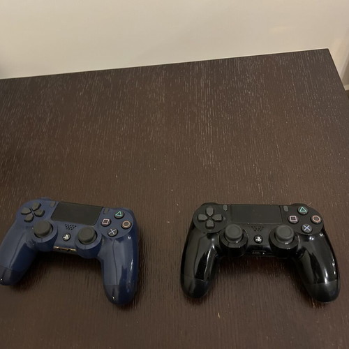Logitech G29 steering wheel with PlayStation 4 Slim console, 2 controllers, 4 games used