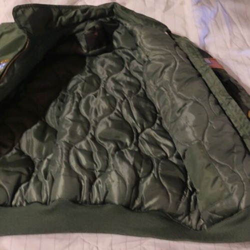 Flight jacket with embroidered patches like new, size 12