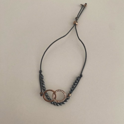 Gregio bracelet used, grey with rose gold charm