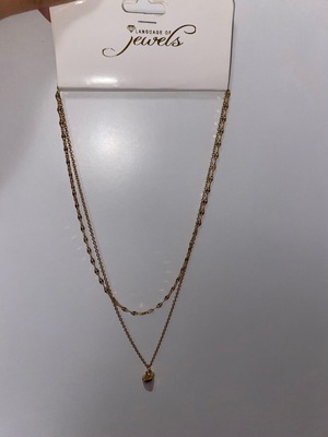Women's gold necklace unused