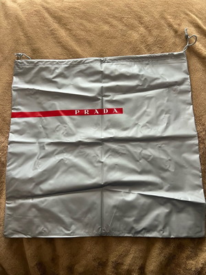 Prada case new, grey with red logo