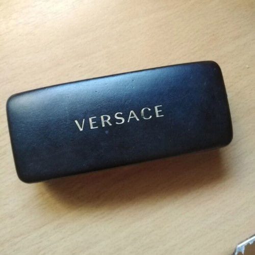 Versace women's sunglasses like new, dark burgundy frame
