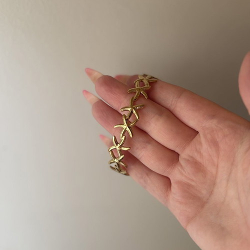 Gold Stainless Steel Bracelet with Starfish Design like new