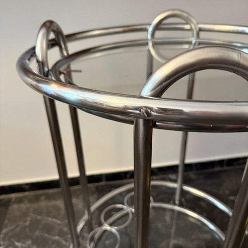 Vintage round trolley bar used with chrome tubular steel and glass shelves