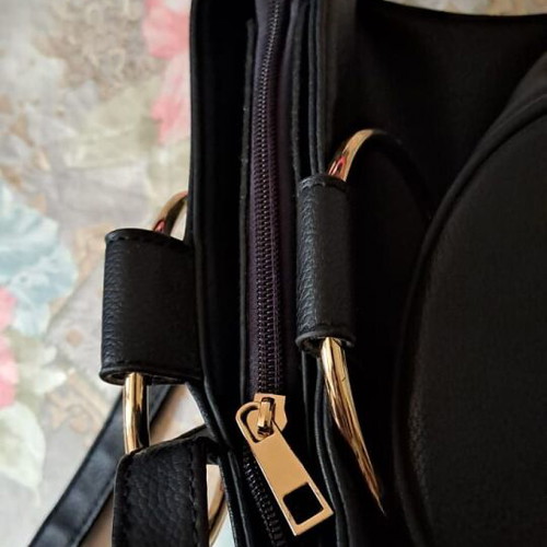 Bucket bag black faux leather with metal rings like new