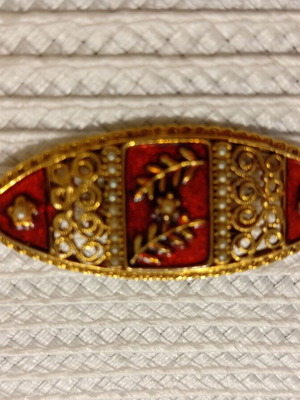 Vintage brooch with red enamel and gold floral design like new