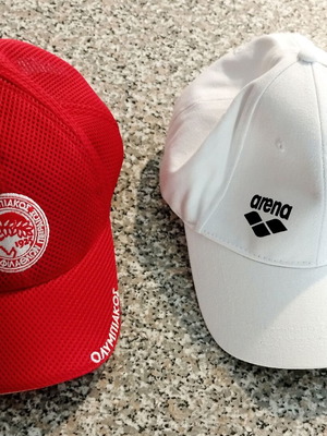 Arena white cap and Olympiakos red cap set