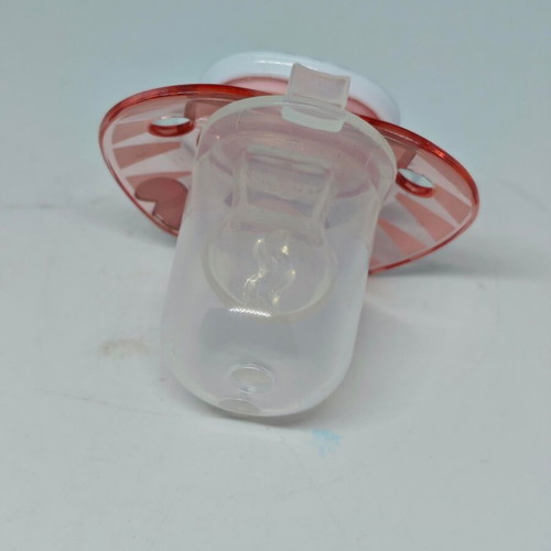 Silicone pacifier with cap and cat design like new, pink