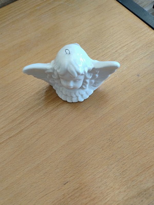 Ceramic decorative angel figurine