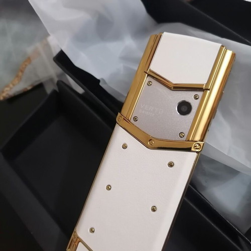 Vertu phone new, gold with metal leather body and dual card slot