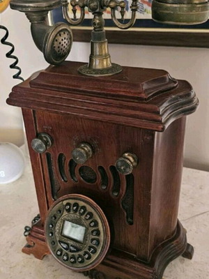 Retro telephone with wooden case