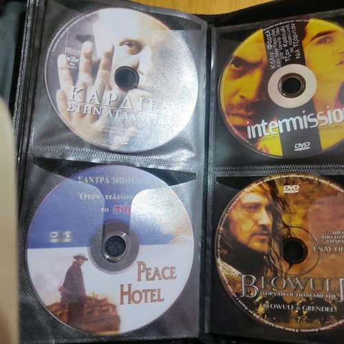 DVD set of 56 with foreign movies like new, in case with sleeves