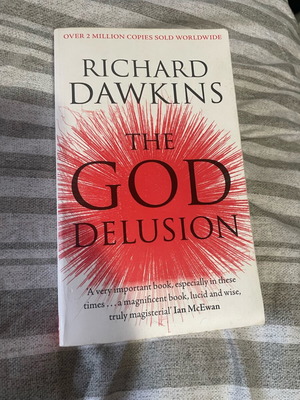 The God Delusion book used with classic yellowing