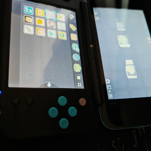 Nintendo 2DS XL like new with stylus, charger, and 4GB SD card