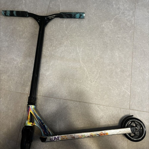 Scouter Envy scooter used with new handles, wheels, and grip tape