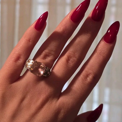 Avon ring with pink stone like new, adjustable size