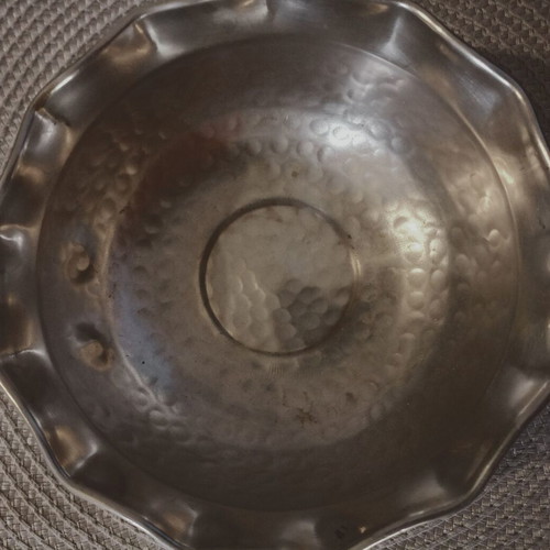 Metal decorative item used with perimeter detail