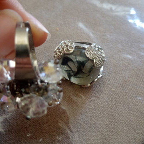 Set of 3 bulky rings used, size 18.5, missing some stones