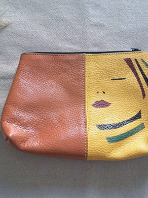 Handmade leather clutch with painted design