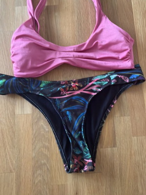 Bikini small sugar free top and funky Buddha bottom like new, black and pink