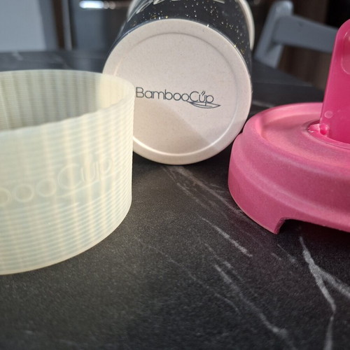 Tupperware and Bamboocup coffee cups used, broken lid on Bamboo cup