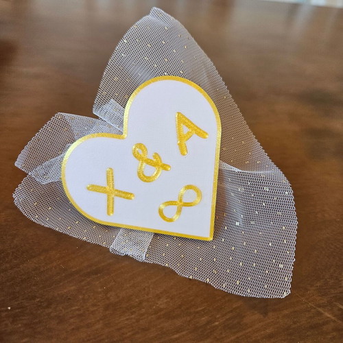 Heart-shaped bomboniera-soupla custom made with gold trim